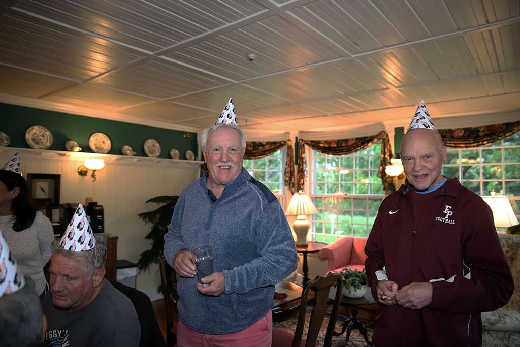 wearing funny hats for birthday celebration