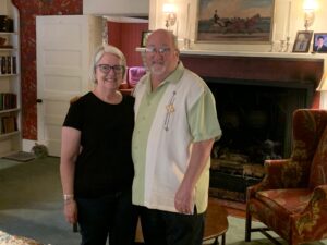 Ellen and Don Clark standing in the Gathering Room at the in. 